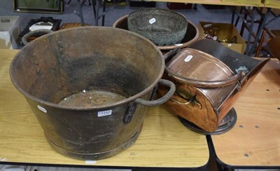 Lot 1142 - A copper coal scuttle, copper twin handled pan, Middle Eastern jardiniere, two flat irons and a...
