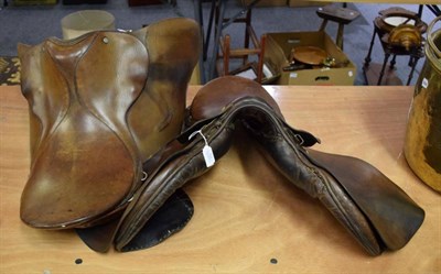 Lot 1143 - Two hunting leather saddles