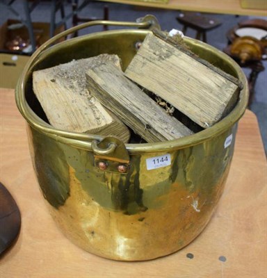 Lot 1144 - A 19th century swing handled brass log bin
