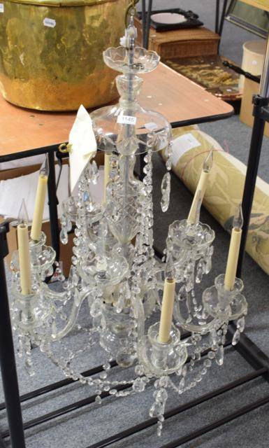 Lot 1145 - A cut glass six light lustre drop chandelier