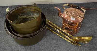 Lot 1170 - A 19th century three piece brass companion set, three brass jam pans with wrought iron handles...