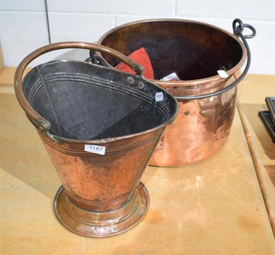 Lot 1187 - A 19th century copper log bin with iron swing handle and a copper coal scuttle (2)