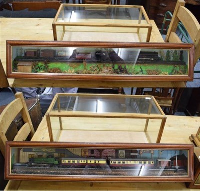 Lot 1199 - Two glazed railway dioramas and two glazed display cabinets