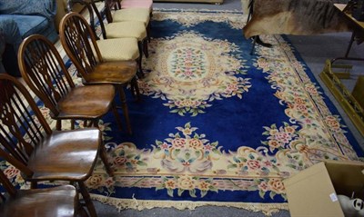 Lot 1231 - Chinese ''Savonnerie'' carpet, the faded royal field with central floral medallion framed by floral