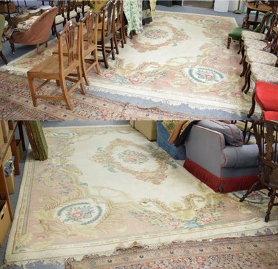 Lot 1233 - Pair of Indian 'Savonneri' design carpets, each with cream ground and central floral medallion...