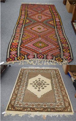 Lot 1234 - Machine made carpet, the brick red field with columns of willow trees, enclosed by floral...