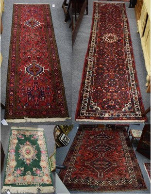 Lot 1236 - A Khamseh rug, 240cm by 170cm;  together with two North West Persian runners,  208cm by 65cm;...