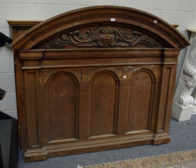 Lot 1248 - An oak fire surround with triple arch panelled superstructure