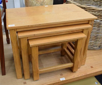 Lot 1259 - A nest of three Unicorn man oak coffee tables