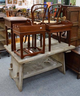 Lot 1268 - A group of furniture comprising a weathered stripped country made oak trestle table and a pair...