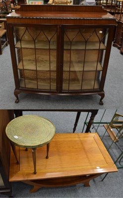 Lot 1273 - A mahogany china cabinet; a modern cherrywood coffee table; and a small brass top table  (3)