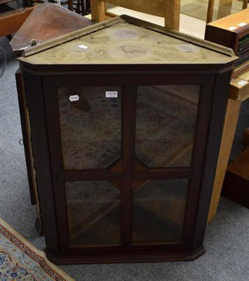 Lot 1276 - A glazed mahogany hanging corner cupboard