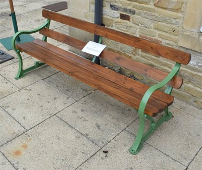 Lot 1291 - A green painted garden seat by Spencer Heath and George Ponders End