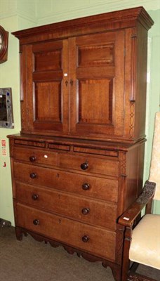 Lot 1313 - George III oak linen press with secret drawer