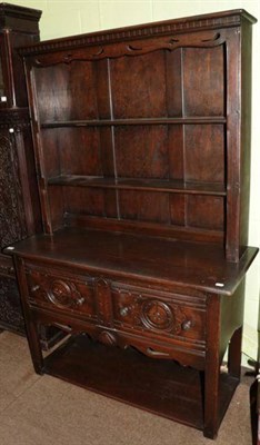 Lot 1315 - A 20th century oak dresser and rack