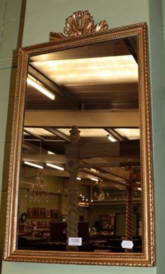 Lot 1320 - A gilt framed mirror with shell pediment