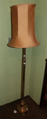 Lot 1322 - A brass standard lamp with reeded decoration