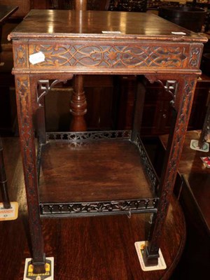 Lot 1339 - A 19th century square mahogany occasional table, decorated with blind fretwork, the shelf stretcher