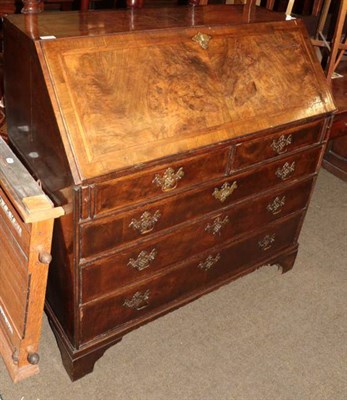 Lot 1346 - A 19th century walnut veneered bureau