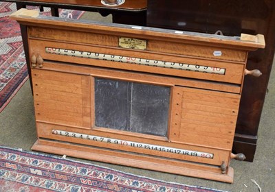Lot 1347 - An early 20th century E Mawson, Leeds oak billiards scoreboard