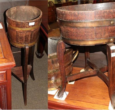 Lot 1350 - A brass bound oak coal bucket; and two brass bound jardiniers on stands