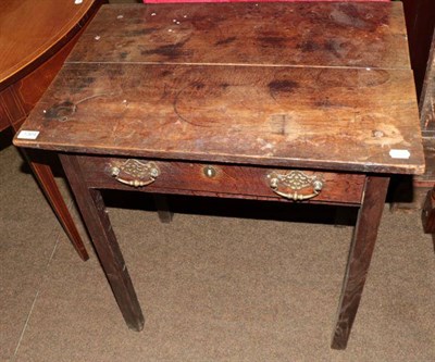 Lot 1364 - A George III provincial oak side table fitted with a drawer