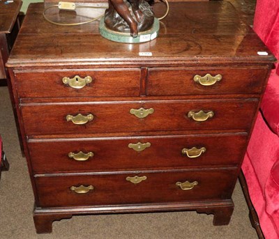 Lot 1366 - An 18th century Georgian oak chest of small proportions