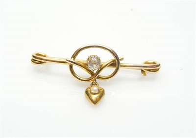 Lot 441 - A Diamond Bar Brooch with Heart Pendant, a knot motif centred by an old cut diamond, a seed...