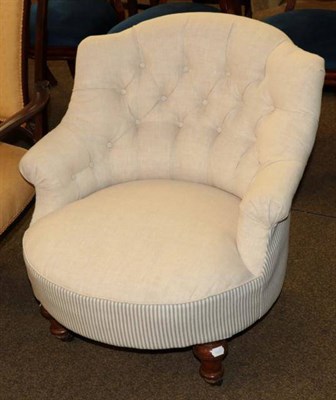 Lot 1378 - A Victorian button back chair in later cream and blue stripe upholstery