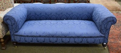 Lot 1402 - A blue upholstered Chesterfield sofa