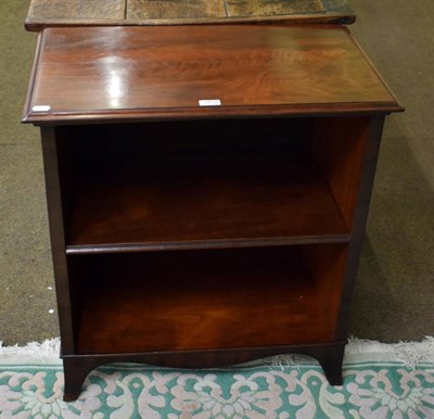 Lot 1419 - A small mahogany bookcase with splay feet