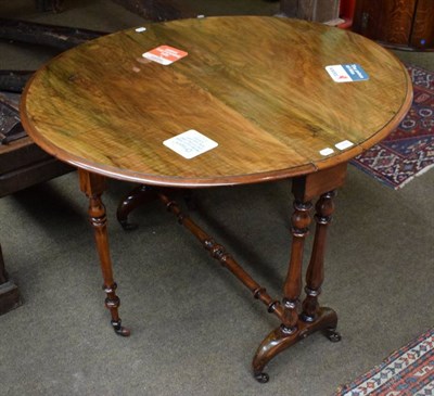 Lot 1444 - A Victorian walnut Sutherland table