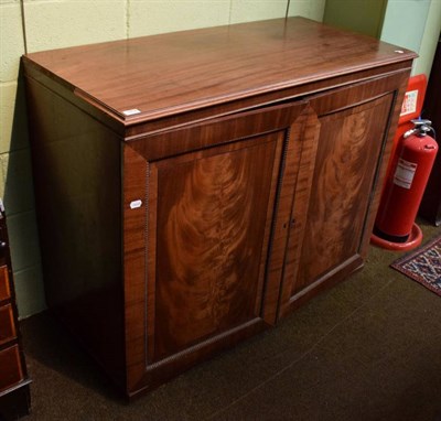 Lot 1454 - A late George III mahogany cupboard (the upper section from a linen chest)