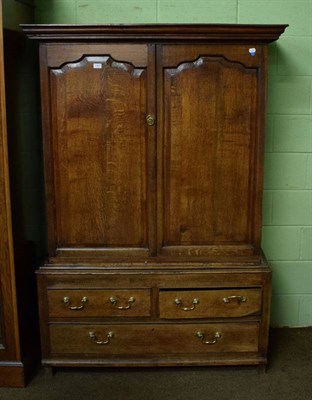 Lot 1461 - A Georgian oak press cupboard (alterations)