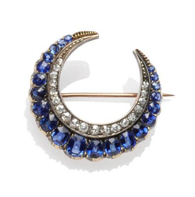 Lot 451 - A Late Victorian Sapphire and Diamond Crescent Brooch, the three quarter circle comprises a row...