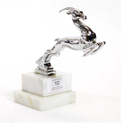 Lot 10 - A 1960's Chrome Car Mascot, as a Leaping Gazelle, mounted on a grey and white marble base, 14cm...