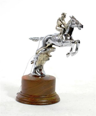 Lot 12 - A 1950/60 Car Accessory Mascot, as a Horse and Jockey taking a Fence (rechromed), mounted on a...