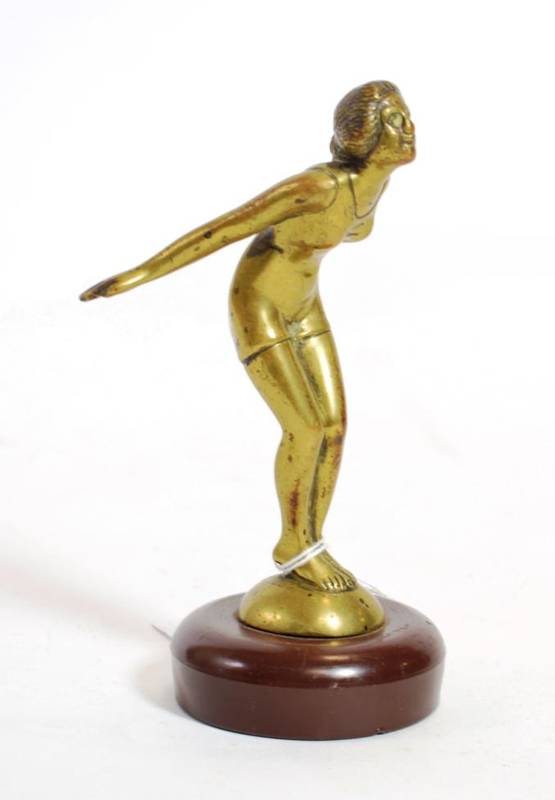 Lot 19 - A 1920/30 Solid Brass Car Mascot, as a bather, her arms outstretched in a diving position, 12cm...
