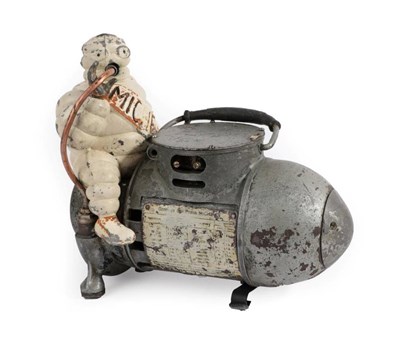 Lot 120 - A 1930's French Michelin Tyre Compressor, the pump in the form of an artillery shell surmounted...