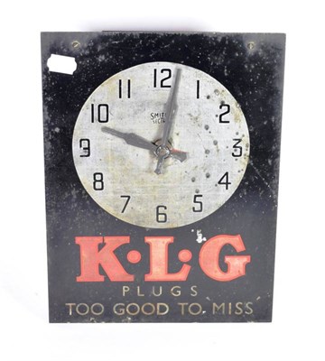 Lot 139 - A Vintage Smith's Metal Advertising Clock, KLG Plugs Too Good To Miss, the verso fitted with a...