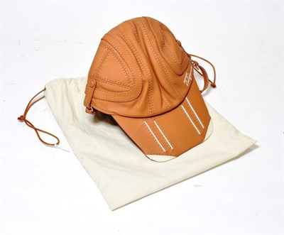 Lot 141 - An Official Ferrari California Brown Leather Racing Cap, model F91148, in unused condition,...