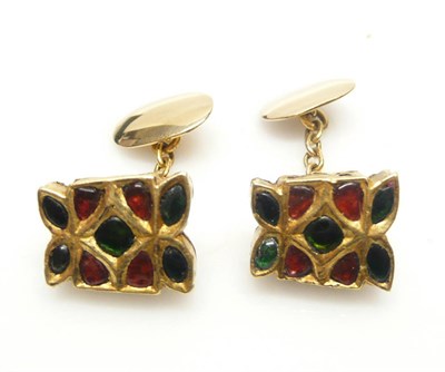 Lot 472 - A Pair of Cufflinks, in the Kundan style, each panel with red and green foil backed stones...