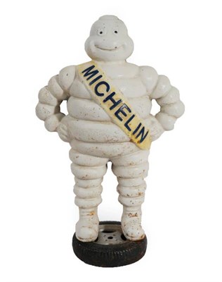 Lot 203 - A Michelin Man White Painted Metal Advertising Figure, wearing a sash with blue lettering...