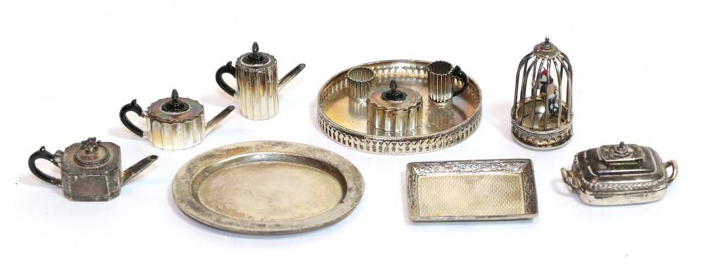 Lot 2010 - Miniature Silver and Plated Dolls House Accessories, comprising an oval silver plate, three...