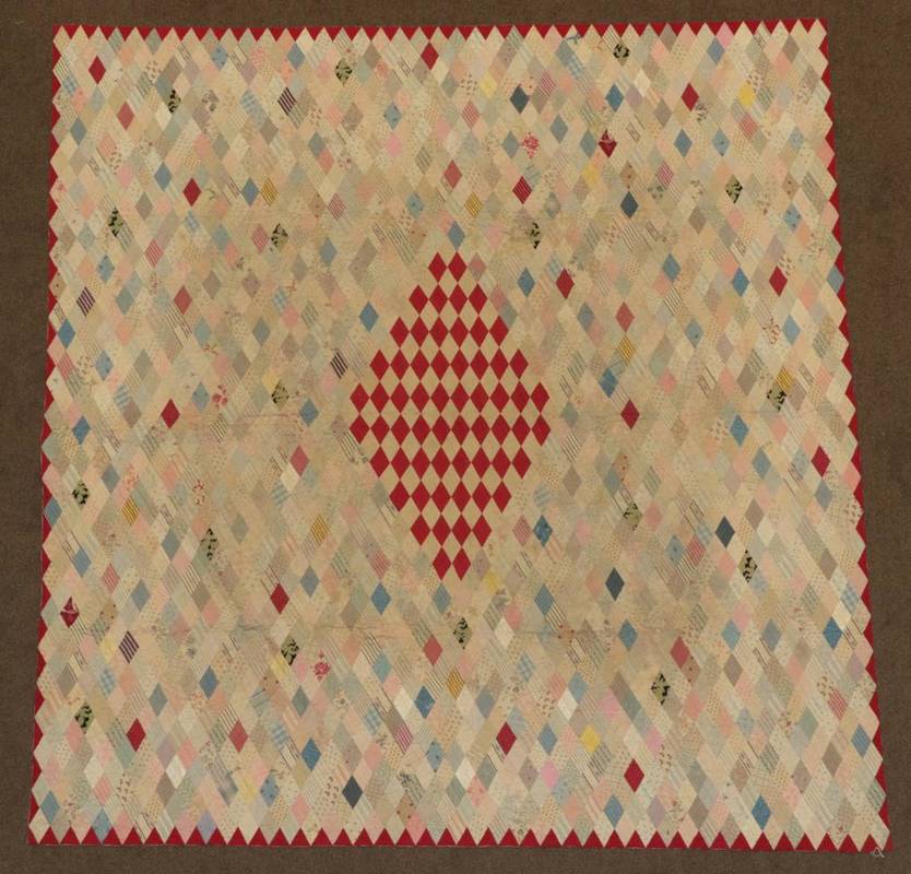 Lot 2015 - Late 19th Century Diamond Patchwork Quilt, with central large diamond enclosing smaller turkey...