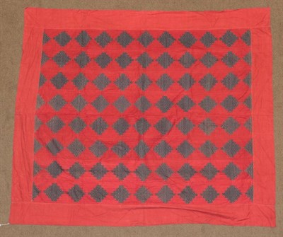 Lot 2019 - Late 19th Century Patchwork Bed Cover, worked on patches of turkey red cotton with blue and...