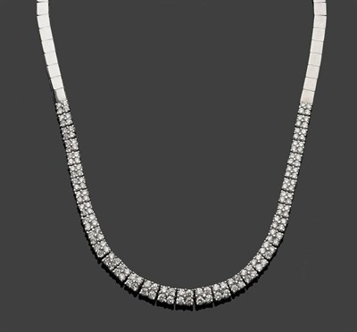 Lot 482 - A Diamond Necklace, graduated articulated square links each set with four round brilliant cut...