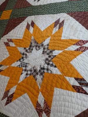 Lot 2036 - Early 20th Century American Eight Pointed Star Block Quilt, incorporating vibrant colours of yellow