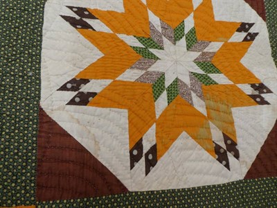 Lot 2036 - Early 20th Century American Eight Pointed Star Block Quilt, incorporating vibrant colours of yellow