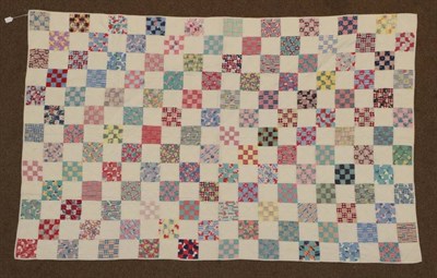 Lot 2037 - Circa 1930s American Mid West Single Quilt, decorated with alternating designs of sixteen patchwork